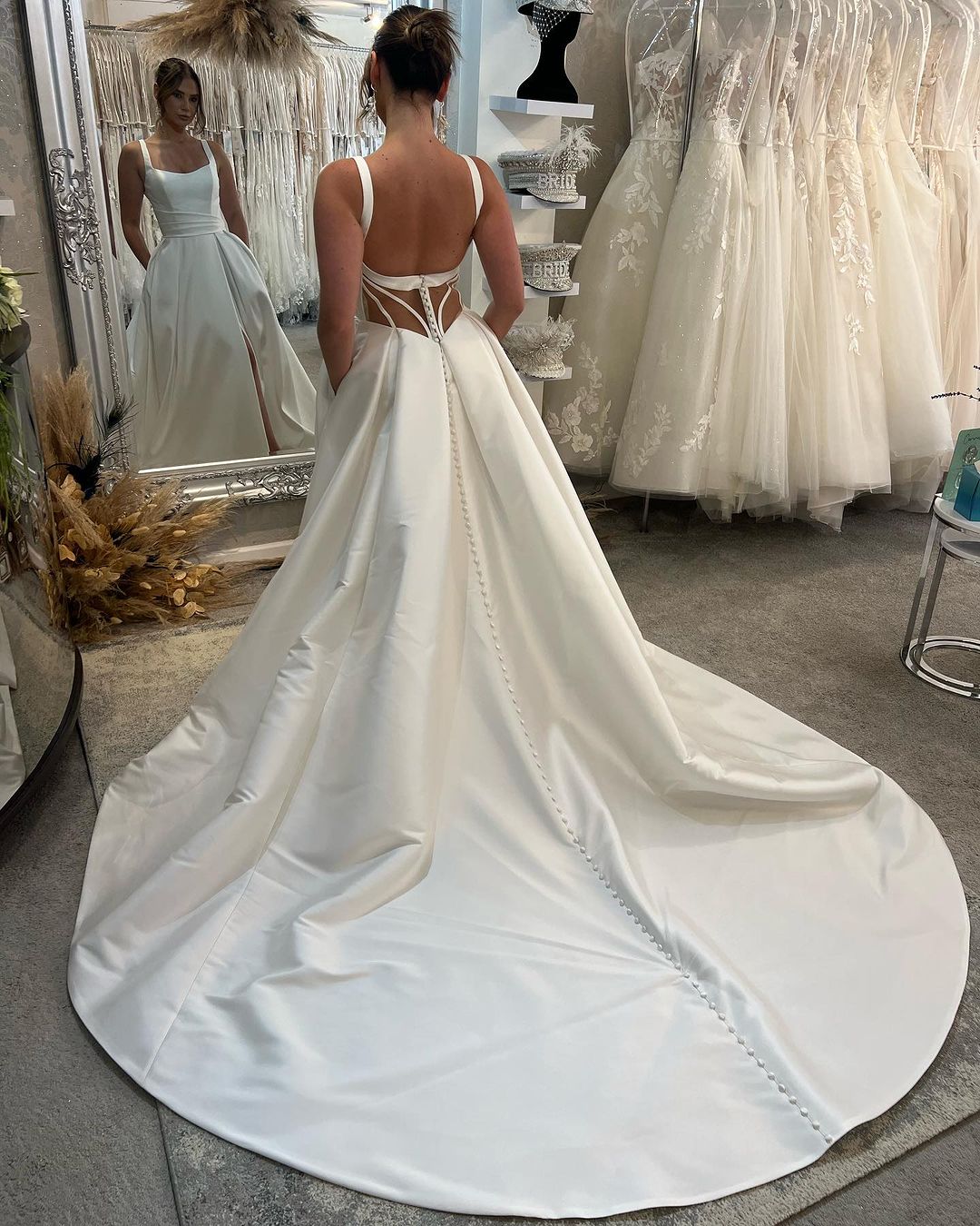 Graceful Long Ivory A-line Straps Satin Sleeveless Backless Wedding Dress With Slit