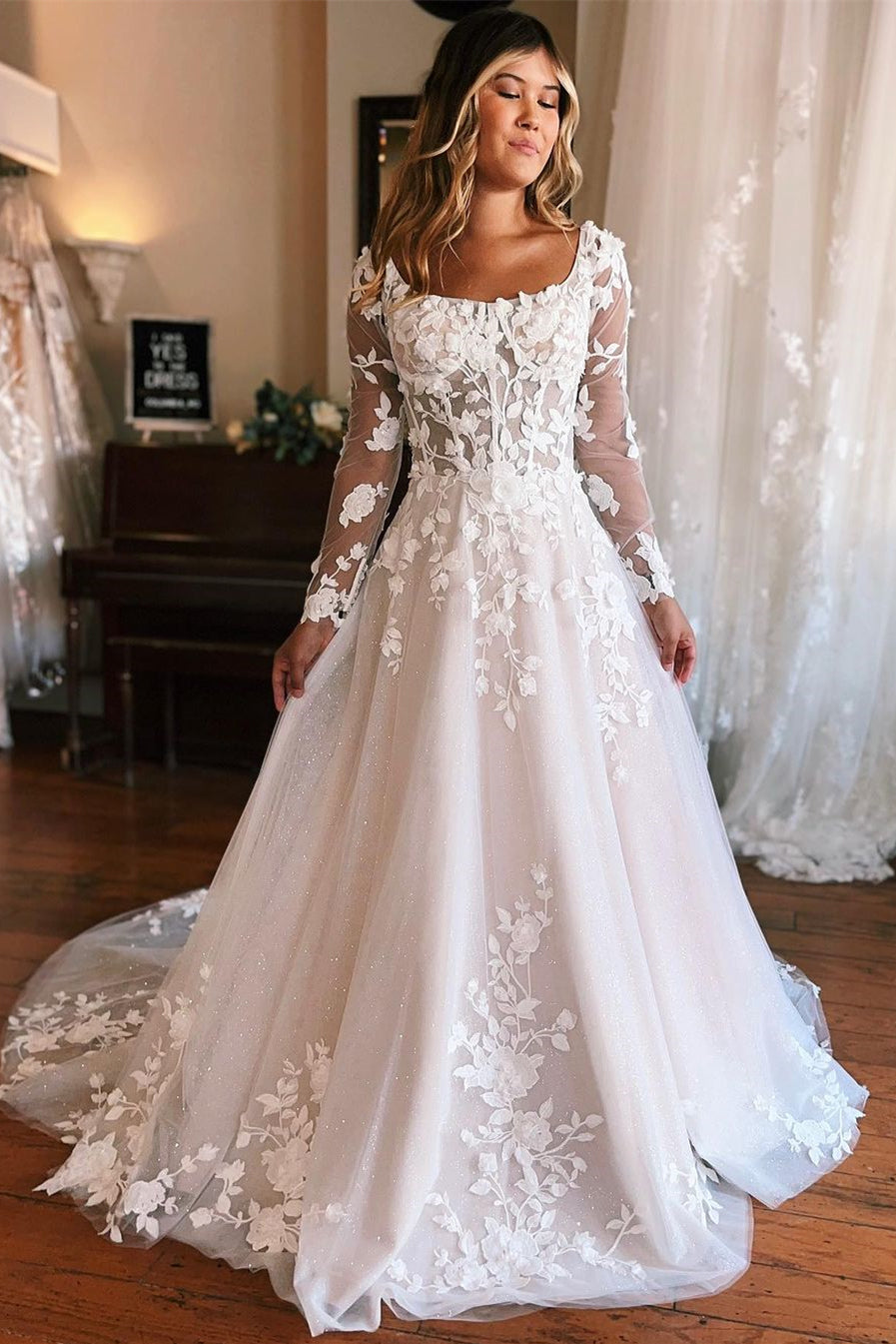 Charming Long A-line Wedding Dress With Appliques And Long Sleeves Featuring A Train