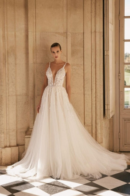 Elegant Spaghetti Straps Sleeveless A-Line Lace Wedding Gown with Refined Accents