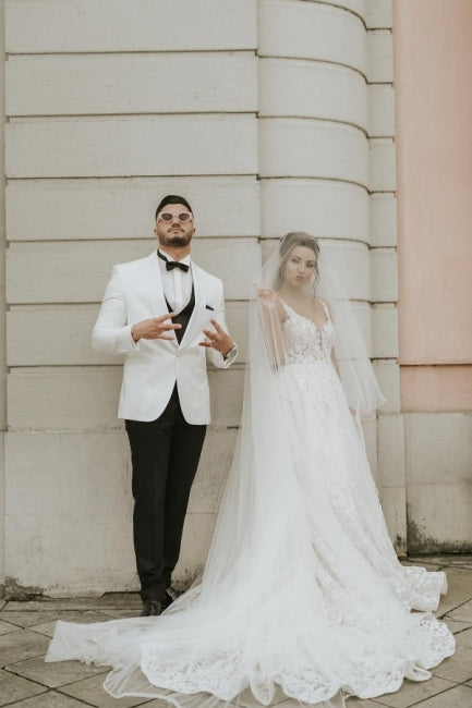 Ivory Sleeveless Straps A-Line Wedding Dress with Flowing Chapel Train