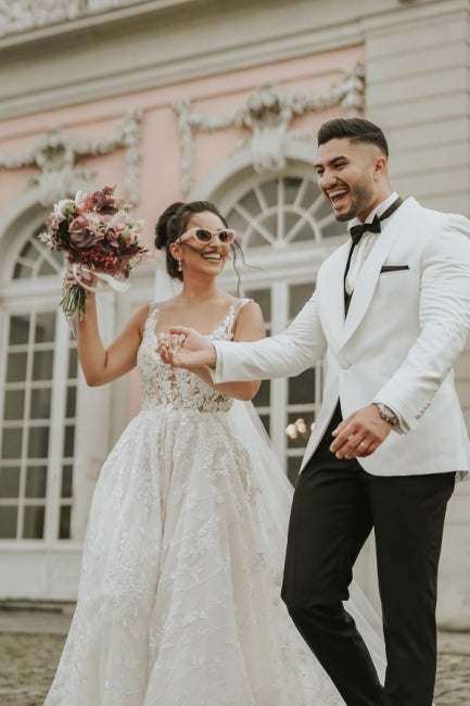 Ivory Sleeveless Straps A-Line Wedding Dress with Flowing Chapel Train