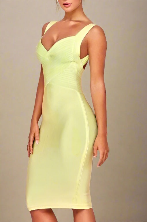 Woman wearing a figure flattering  Kyla Bandage Dress - Sun Yellow BODYCON COLLECTION